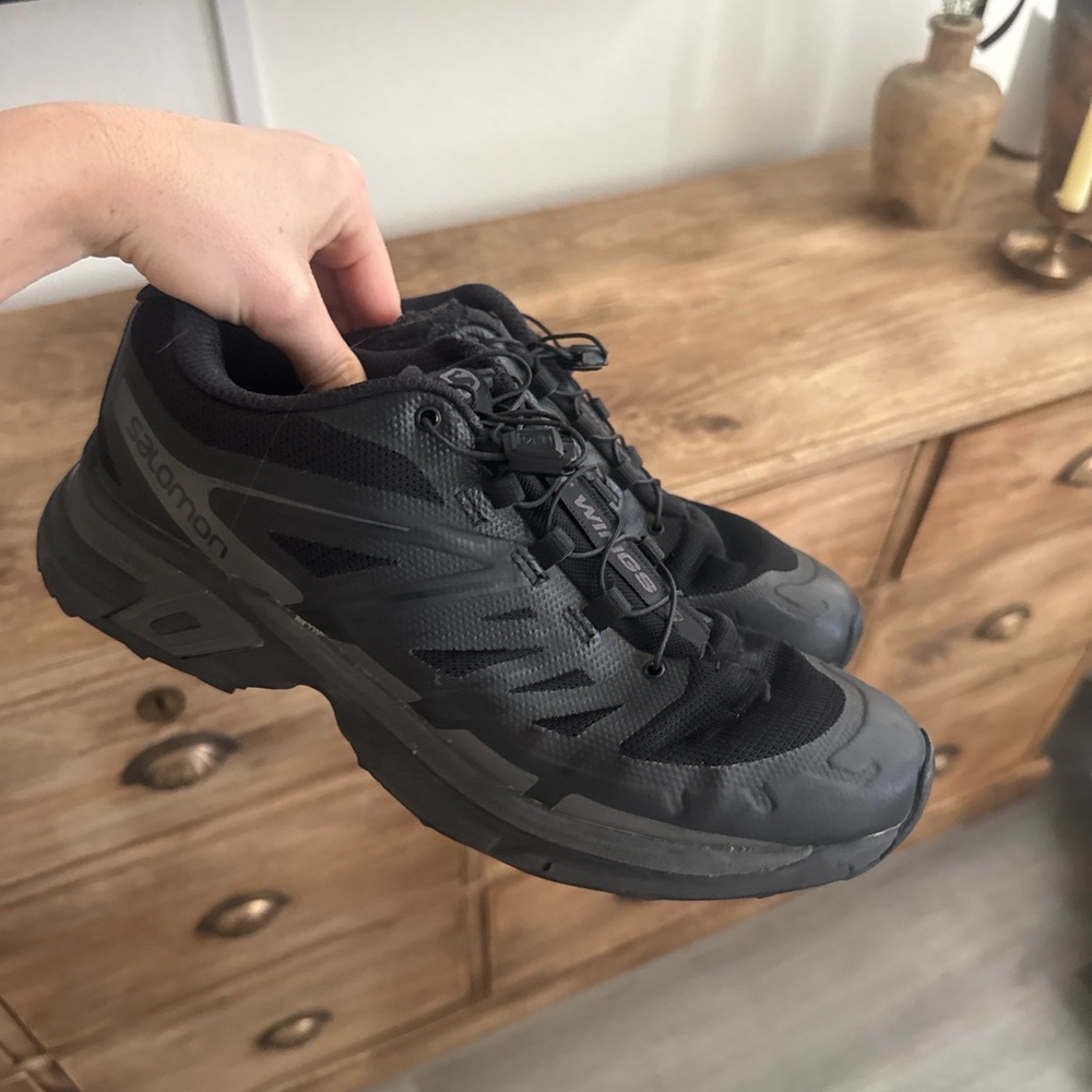 Salomon all black trail running sneakers. Women’s 9 men’s 8